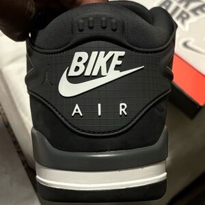 Nigel Sylvester bike air Jordan 4s low driveway